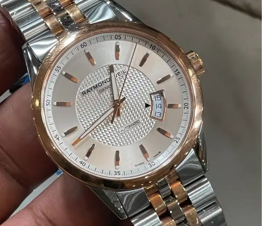 ساعه ريموندويل جديده رجالي كامل المرفقات